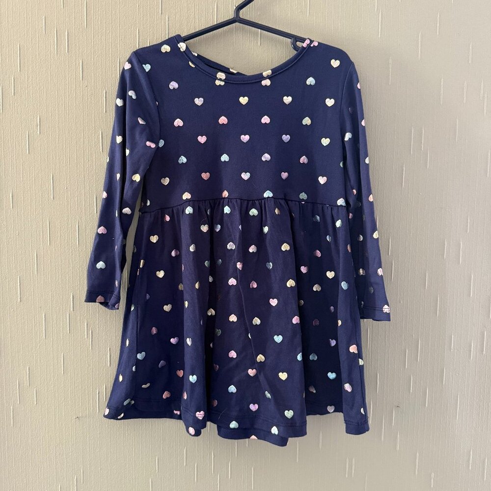 Girl's Freestyle size 4 long sleeve heart accent dress.